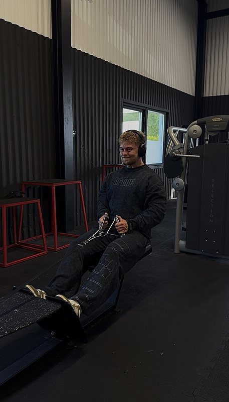 Tobias trener sittende roing